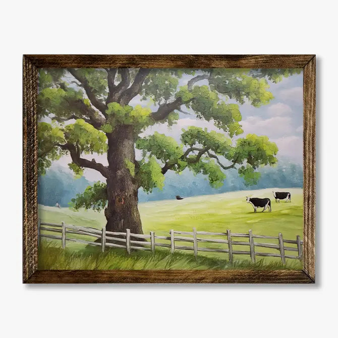 TIMBERLAND FRAME COWS IN A FIELD